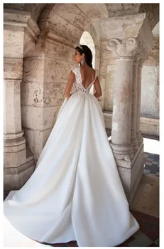Suknia ślubna księżniczka Lori z krótkim rękawem elegancka suknia A-Line suknia z kieszeniami Boho suknia ślubna 2019