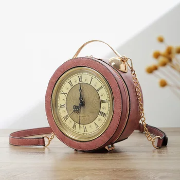 Modelowanie małego okrągłego dzwonka z indywidualnej łańcuchem w nowej postaci kobiecej torebki ręcznie pochyłej torby Clock Bag w 2019 roku