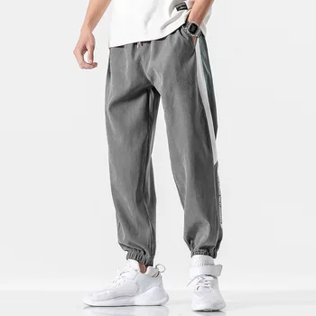 2020 lato nowa moda cienki plasterek spodnie mężczyźni casual spodnie Zawodnik kulturystyki fitness pot czas jest ograniczony spodnie dresowe
