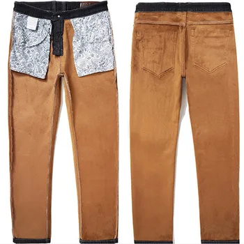 Zimowe spodnie jeansowe męskie ciepłe denim plus rozmiar 42 46 48 50 52 150 kg czarne spodnie elastyczne z wysokim stanem męskie флисовые spodnie gęstnieją Jean