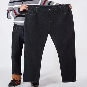 Zimowe spodnie jeansowe męskie ciepłe denim plus rozmiar 42 46 48 50 52 150 kg czarne spodnie elastyczne z wysokim stanem męskie флисовые spodnie gęstnieją Jean