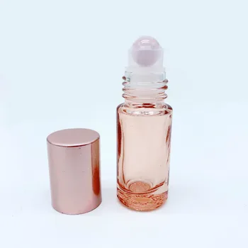 10 szt. różowy kwarc Rolkowa butelka 5 ml 10 ml różowe szkło olejek butelka wielokrotnego podróży butelki naturalny kamień różowy kryształ